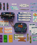 Open Tiny But Mighty Travel First Aid Kit For Kids, 60-Piece Mini Set with bandages and supplies on purple background