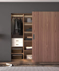 Concealed Barn Door Hardware Kit With Soft Close, Invisible Wall Mount Aluminum Track For 28 To 32 Inch Openings, Hidden Sliding Door System installed on a closet, showing door partially open