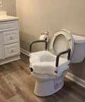 Raised Toilet Seat With Handles 4.5 Inch Lift For Elongated And Round Toilets, Safe Locking Arms For Stability installed on toilet