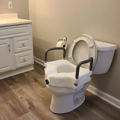 Raised Toilet Seat With Handles 4.5 Inch Lift For Elongated And Round Toilets, Safe Locking Arms For Stability installed on toilet