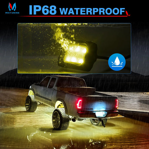 Curved RGBW LED Rock Lights Kit With 12 Pods Underglow Multicolor Neon Lighting on a truck in rainy night showing waterproof feature