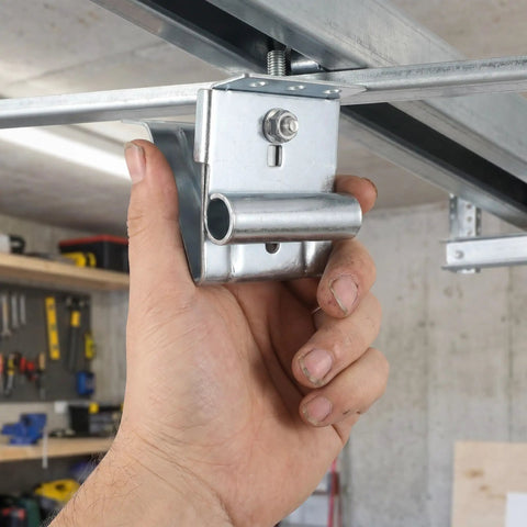 Hand holding 2 Piece Adjustable Garage Door Top Bracket Kit Made Of Galvanized Steel With Anti Oxidation Finish For Home Renovation