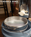 Stainless Steel Honey Strainer With Dual Sieve for Beekeeping, extendable arms shown over bucket, fine and coarse mesh filter.
