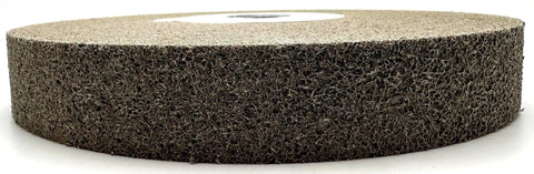 Seven Inch Convolute Deburring Wheel One Inch Thick By One Inch Arbor Hole Silicon Carbide Fine Grit showing dense abrasive texture.