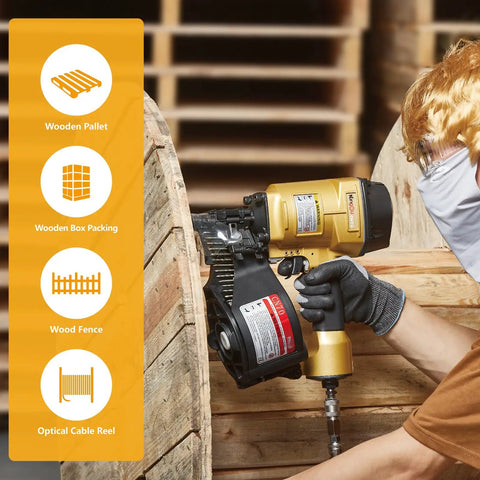 Worker using Coil Siding Nailer Workhorse For Wood Projects on a large cable reel, showcasing durable aluminum housing.