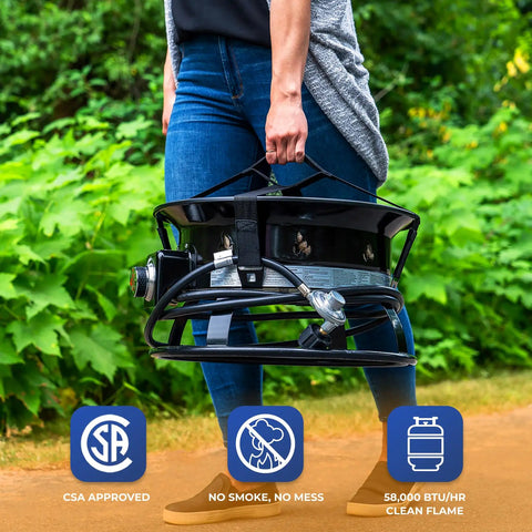 Person carrying Portable Propane Fire Pit 19 Inch Smokeless Gas Firebowl With Carry Kit And Cover, 58,000 BTU, Black 893 Deluxe.