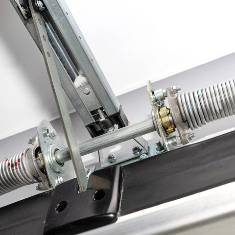 Garage Door Torsion Spring 0.218 Inch Wire By 2 Inch Inside Diameter By 20 Inch Length Left Hand Wind Orange Painted End Single Pack Replacement For Residential And Light Commercial Doors installed on a metal garage structure.