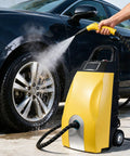High Power 3000W Multipurpose Steam Cleaner With 3.5 Liter Tank cleaning car wheel with steam, showcasing effective grease removal.