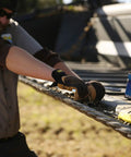 Worker using Fastfit Leather Work Gloves That Keep Your Hands Safe And Grippy For Tough Jobs, Abrasion Resistant and Breathable