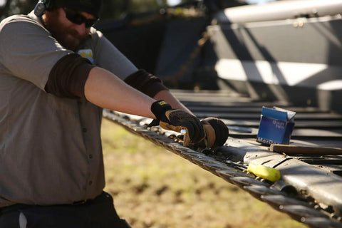 Worker using Fastfit Leather Work Gloves That Keep Your Hands Safe And Grippy For Tough Jobs, Abrasion Resistant and Breathable
