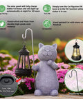 Solar Powered Cat Garden Statue With Warm Glow Lantern made of weatherproof resin, showcasing energy saving features in a garden setting.