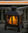 45 Inch High Metal Chiminea Fire Pit With Grill 2 In 1 Bonfire And BBQ Outdoor Wood Burning Fireplace, lit at night