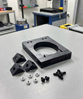 Solid CNC Motor Mounting Bracket For Spindle 65mm Engraving Machine Stand with clamp and hardware components on workbench.