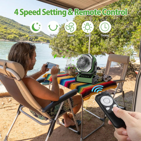 Person relaxing with Ultra Powerful 20000mAh Camping Fan With Light And Remote Auto Oscillating Fan on table outdoors