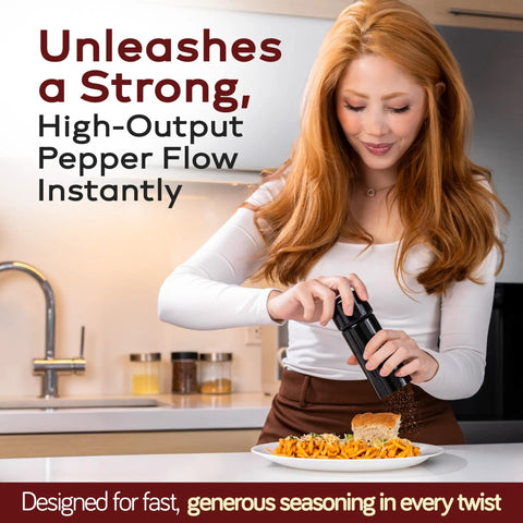 Woman using the Unicorn Pepper Mill By Tre Spade Premium Kickin Manual Pepper Grinder on pasta in a kitchen setting.