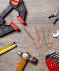 Tools surrounding 49-Piece M6 Hex Socket Screws and Barrel Nut Set for Furniture Repair on wooden surface