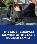 Black bag with Rugged Mini 4TB 2.5 Inch Portable External Hard Drive For PC Mac iPad iPhone With Password Protection displayed outdoors.