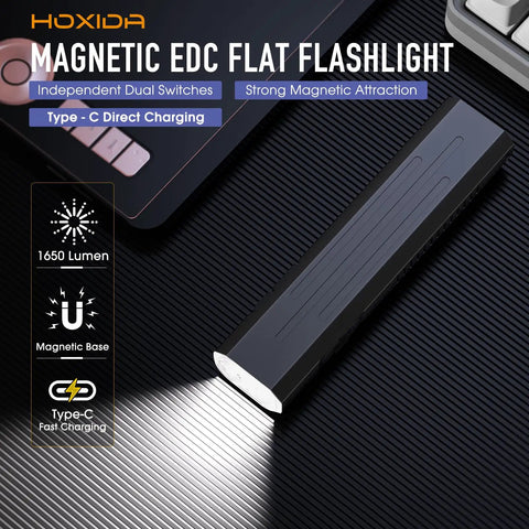 Rechargeable EDC Flashlight Tiny But Mighty Slim Flat Pocket Light With Magnetic Base 1650 Lumen on desk with light beam