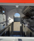 Interior view of Fully Custom Mobile Food Trailer Concession Rig With Complete Commercial Kitchen for vendors.