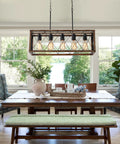 Farmhouse Rustic 5 Light Pendant Chandelier With Adjustable Height Chains Dope Wood Grain Finish over dining table