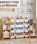 Ultimate Toy Storage Organizer With Bookshelf And 12 Removable Bins For Kid's Playroom, white unit with toys and books.