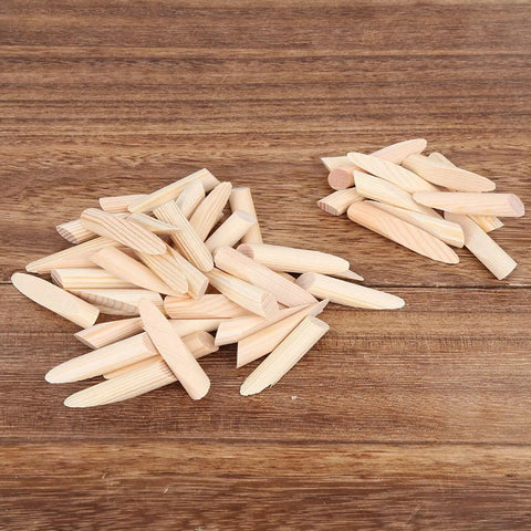 Pocket Hole Plug Kit From Solid Pine Wood Lightweight Durable Woodworking Plugs 50 Piece Set scattered on wood surface