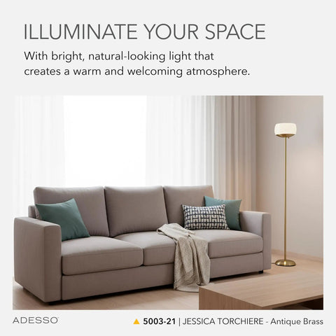 Antique Brass Torchiere Floor Lamp With White Opal Glass Shade Uber Bright 300W Double Socket Uplight 71 Inch Tall Standing Lamp next to a sofa in a living room.