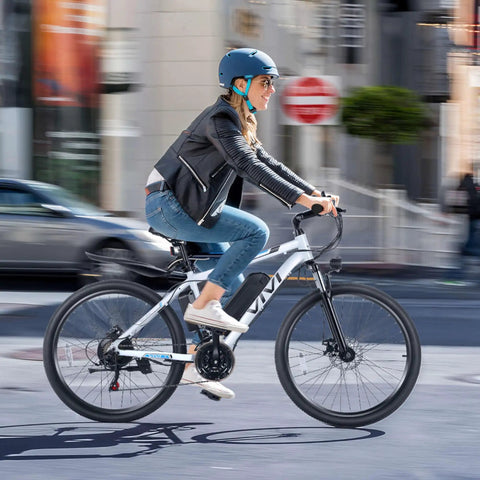 Kick Back And Roll Easy 26 Inch Electric Bike For Adults With 500W Brushless Motor and 48V Removable Battery in motion on city streets.