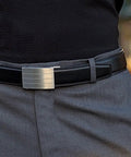 Person wearing Men's Full-Grain Leather Track Belt With Evolve Stainless Steel Buckle Micro Adjustable Hidden Track System