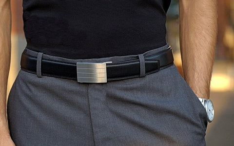 Person wearing Men's Full-Grain Leather Track Belt With Evolve Stainless Steel Buckle Micro Adjustable Hidden Track System