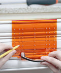 DIY Friendly No-Fuss All In One Cabinet Door And Drawer Drill Mounting Template For Precise Knob And Pull Installation in use on drawer