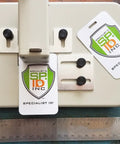 Heavy Duty Desktop Slot Punch For ID Cards And Bulk Badges With Precision Adjustable Slide Guides, showing ID cards and punch mechanism.