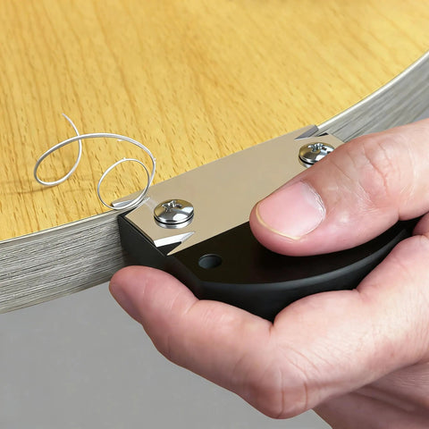 Close-up of Pro Grade Edge Banding Trimmer for Woodworking 2026 in use on wooden edge, showing durable trimmed veneer curl.