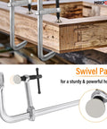 Heavy Duty Welding F Clamp 24 Inch Set in use demonstrating swivel pad for stable holds on wood beams, steel bar construction