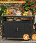 43.3-Inch Outdoor Kitchen Island With Storage Cabinet And Stainless Steel Top set with drinks and fruit in garden setting
