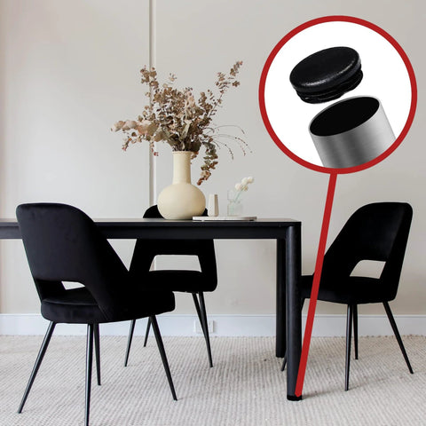 Close-up of 1 Inch Outer Diameter Ribbed Plastic Hole Plugs for round tubing on chair legs, preventing floor scuffs in dining room.