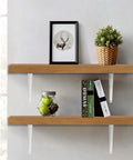 Wooden shelves supported by metal wall corner shelf brackets 10 by 12 inch white pack of 20 with screws in a room setting