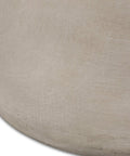 Close-up of smooth surface on Cylindrical Outdoor Side Table In Light Gray For Patio And Backyard Modern Durable End Table
