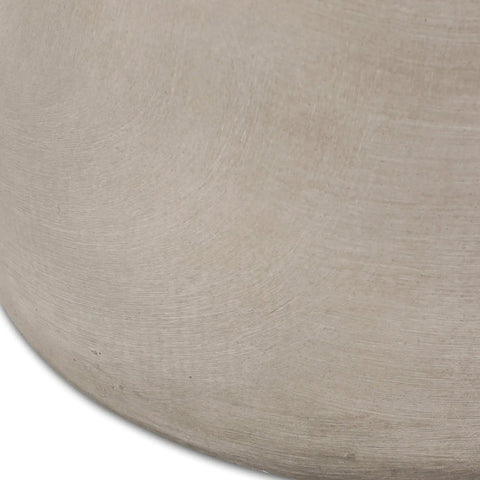 Close-up of smooth surface on Cylindrical Outdoor Side Table In Light Gray For Patio And Backyard Modern Durable End Table