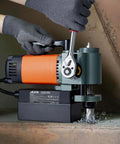 VEVOR low-profile magnetic drill press, side view; orange motor, Weldon shank, drilling metal