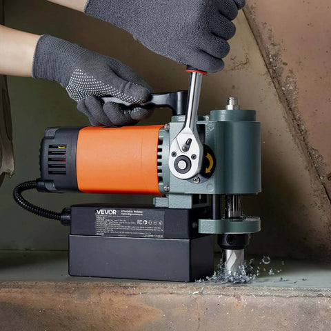 VEVOR low-profile magnetic drill press, side view; orange motor, Weldon shank, drilling metal