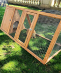 Outdoor Rabbit Hutch And Chicken Coop With Ventilated Wire Run And A Frame Design, wooden small animal cage on grass