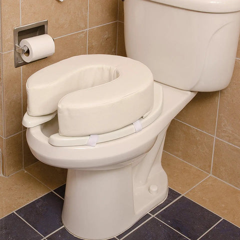 Raised Four Inch Toilet Seat Cushion With Tear Resistant Vinyl Cover relieves pressure points, fits standard toilet.