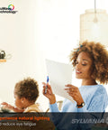 A woman and child reading under TruWave Technology lighting, highlighting natural light benefits for reducing eye fatigue.