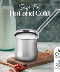 Stainless Steel Coffee Warmer 22oz With Ergonomic Hanging Handle For Turkish And Greek Coffee Lovers on a kitchen counter.