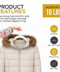 Close-up of hand holding 50 Pack Ultra Slim Velvet Closet Hangers Top Shelf Non Slip Felt Coat Jacket Dress Organizers Space Saving Closet Game Heavy Duty Swivel Hook Smooth Glide Ivory with durable design.