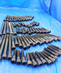 Professional Grade Top Shelf Assorted Socket Head Cap Screws And Hex Drive Bolt Kit Rock Solid Hardware laid out on blue surface.