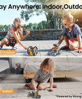 Kids playing with 12 In 1 Solar Robot Building Kit For Kids And Teens Aged 8 To 13 Hands On STEM Toy Powered By The Sun 190 Pieces outdoors and indoors.