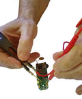 Shielded Two Wire Probe Connector for LCR Reader in use measuring a PCB component