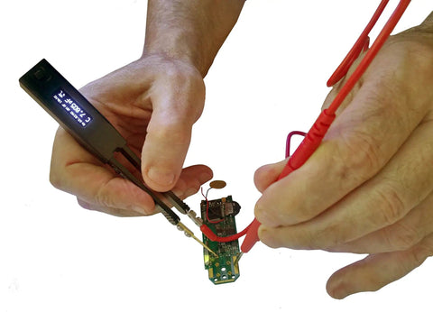 Shielded Two Wire Probe Connector for LCR Reader in use measuring a PCB component